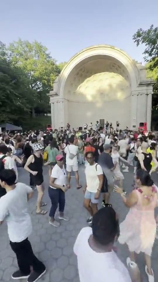The stacks at a bandshell dance in the park