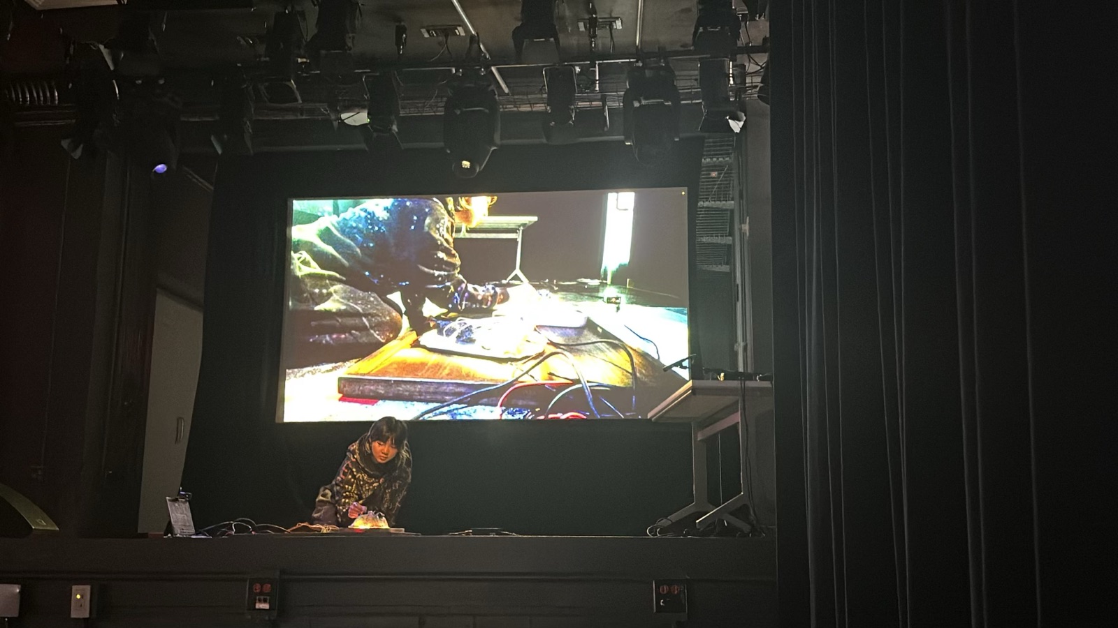 Live performance with a projected close-up of the instruments