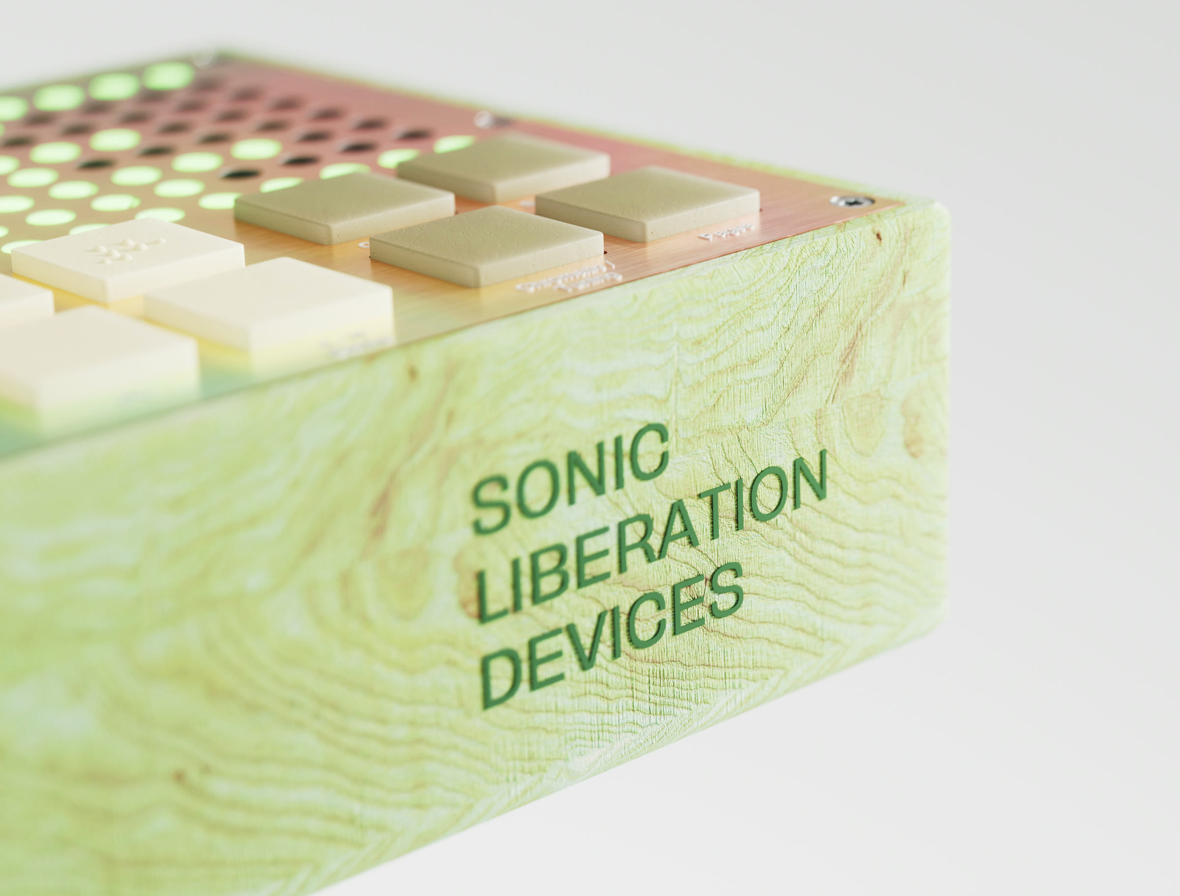 Sonic Liberation Devices engraving on the wood enclosure